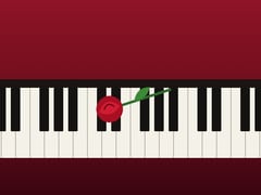 A rose left on the piano